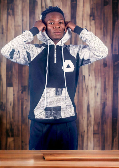 Men's black paper print track hoodie with a modern and stylish design, perfect for urban and athletic wear.