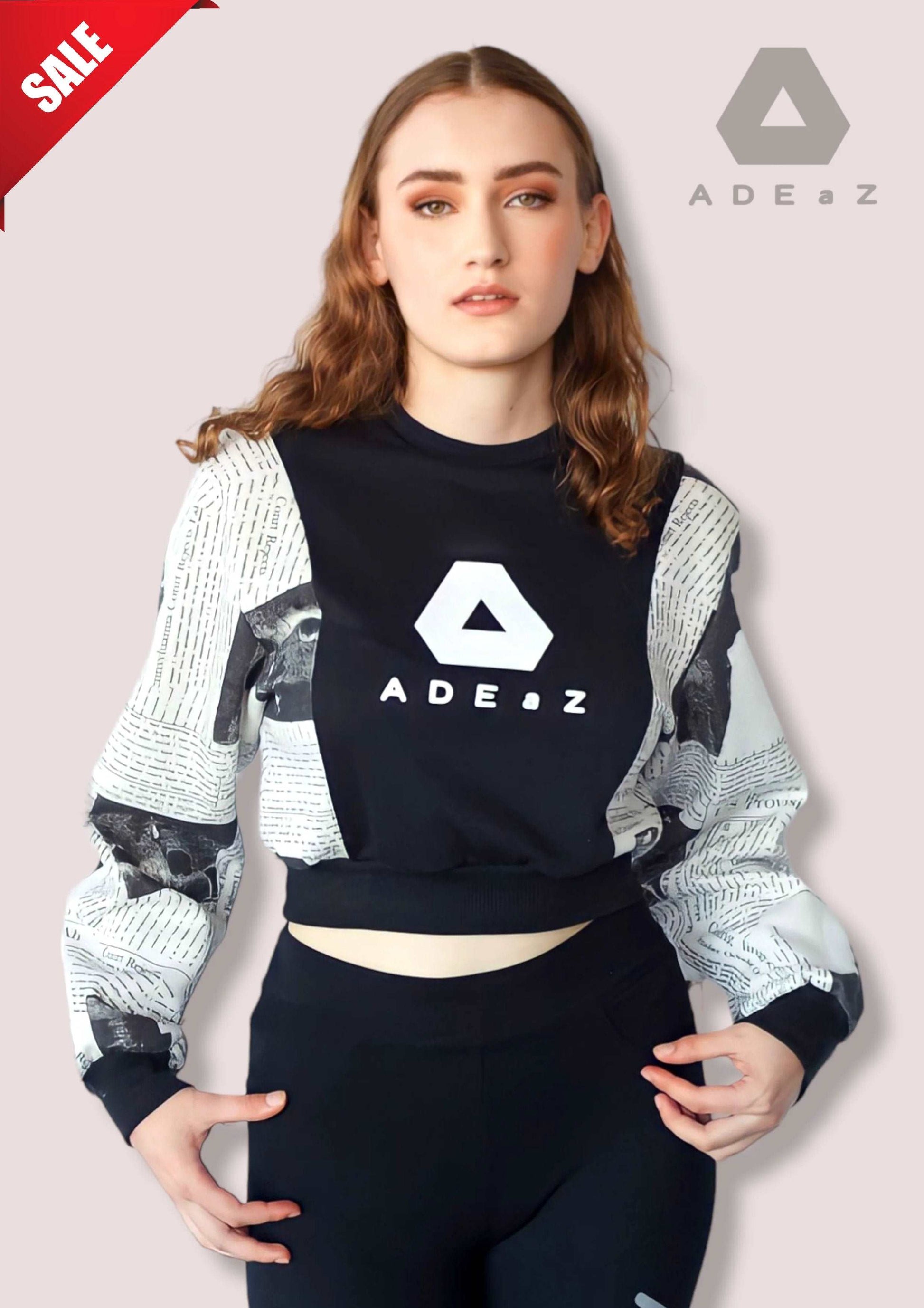 Fleece long sleeve paper print hot crop top for women, a unique blend of warmth and style with artistic patterns