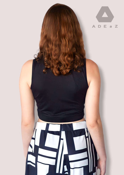 Sleek sleeveless fitted crop top showcasing a stylish, trendy and fashionable design.