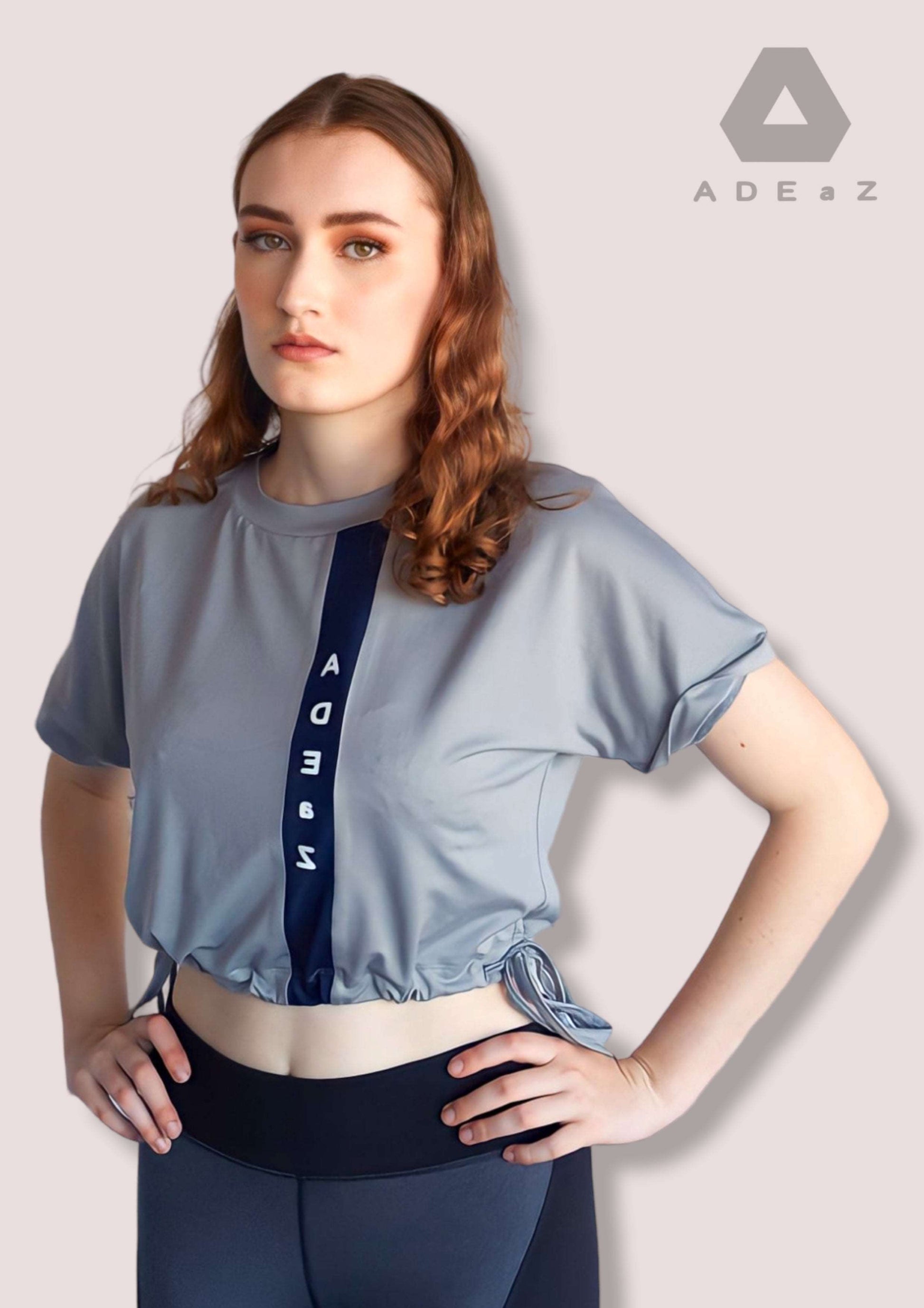 Short sleeve crop top with tie-up detail, offering a trendy and versatile style