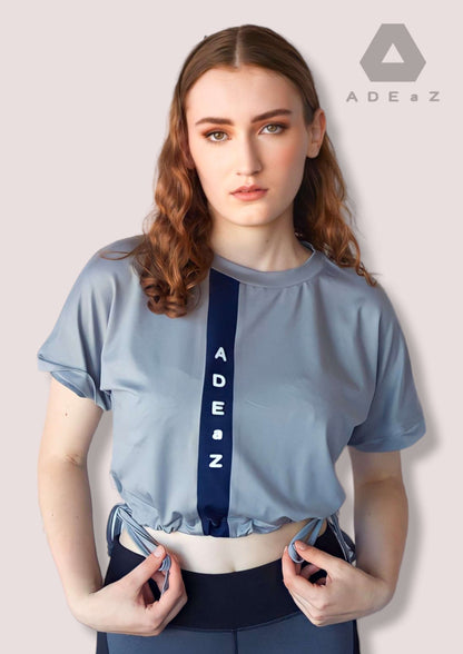 Short sleeve crop top with tie-up detail, offering a trendy and versatile style
