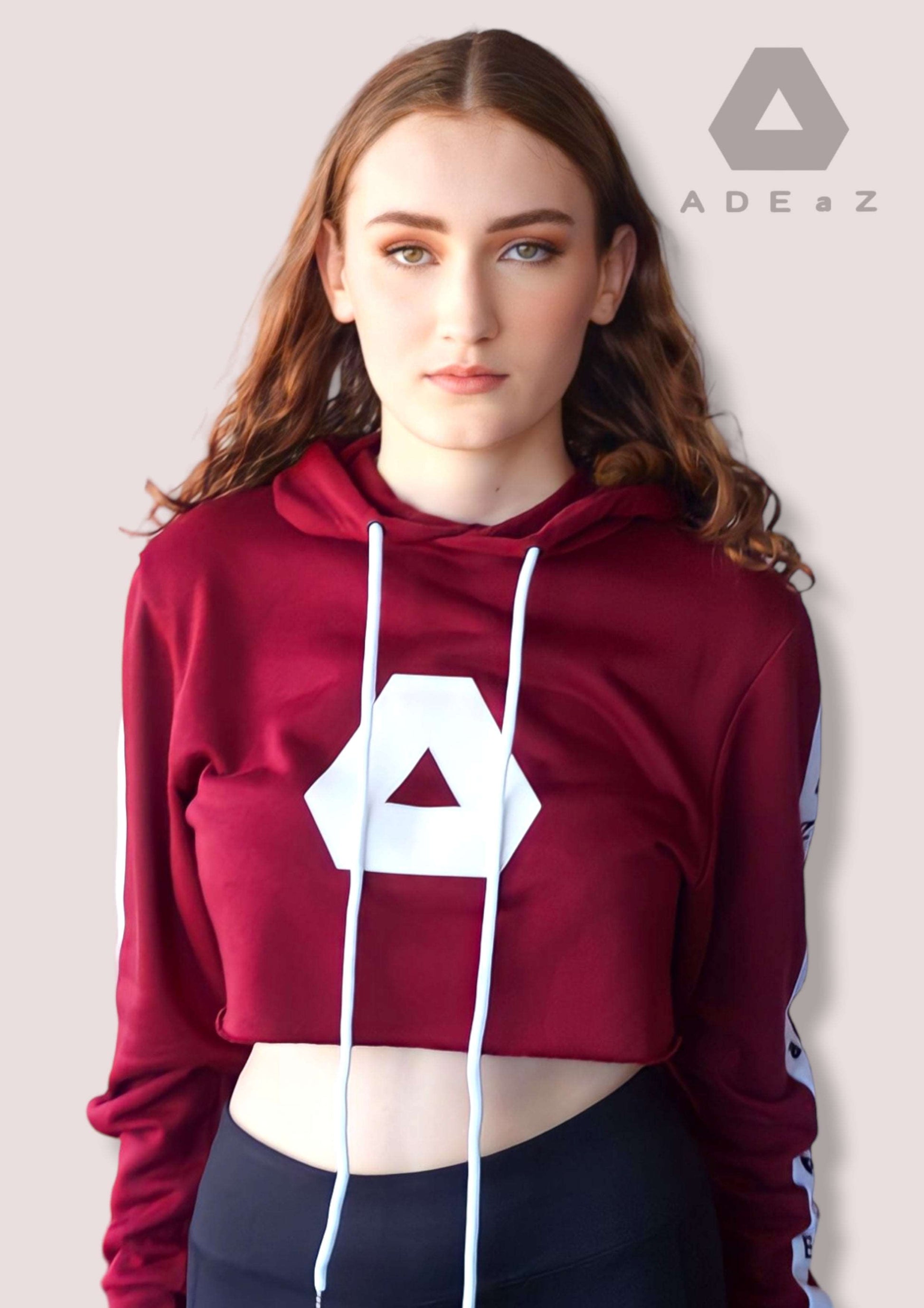  long-sleeve hoodie crop top with drawstrings, combining comfort and style in a fashionable ensemble