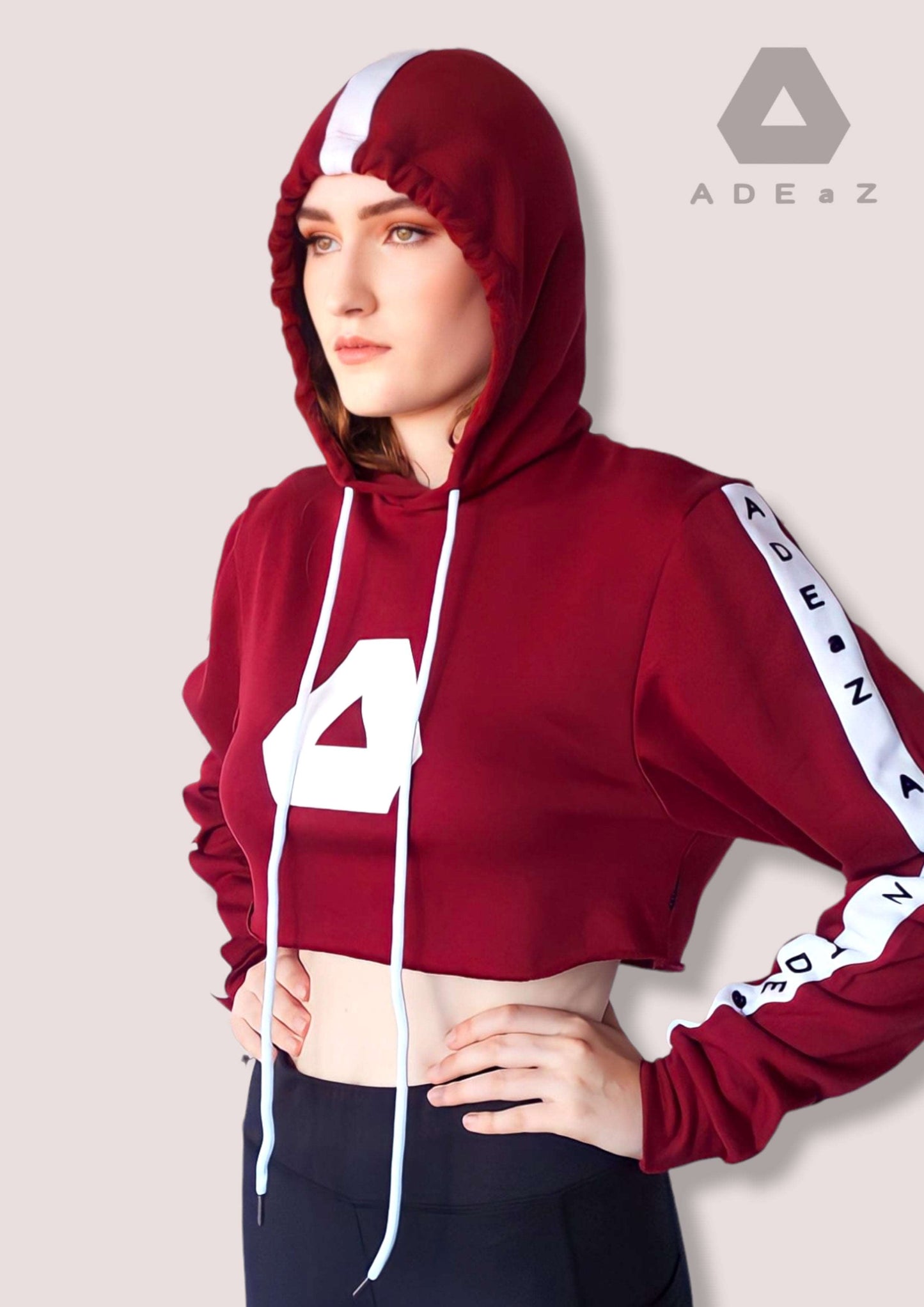  long-sleeve hoodie crop top with drawstrings, combining comfort and style in a fashionable ensemble