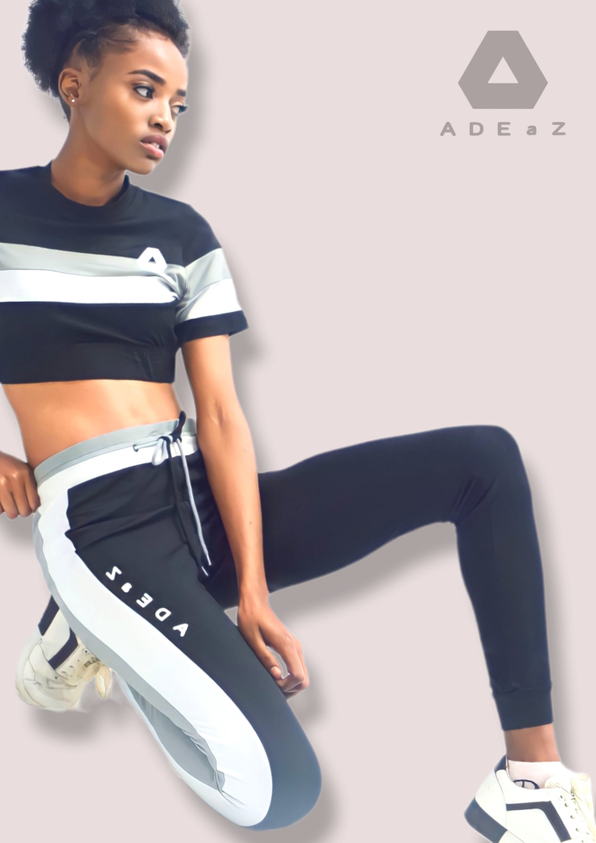 Tapered jogger tights in black, white and charcoal gray, designed for a snug fit and comfortable athletic wear