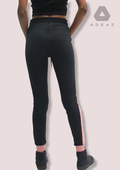 Poly spandex sweatpants featuring jewel-striped accents, blending comfort with a touch of elegant and vibrant detailing.